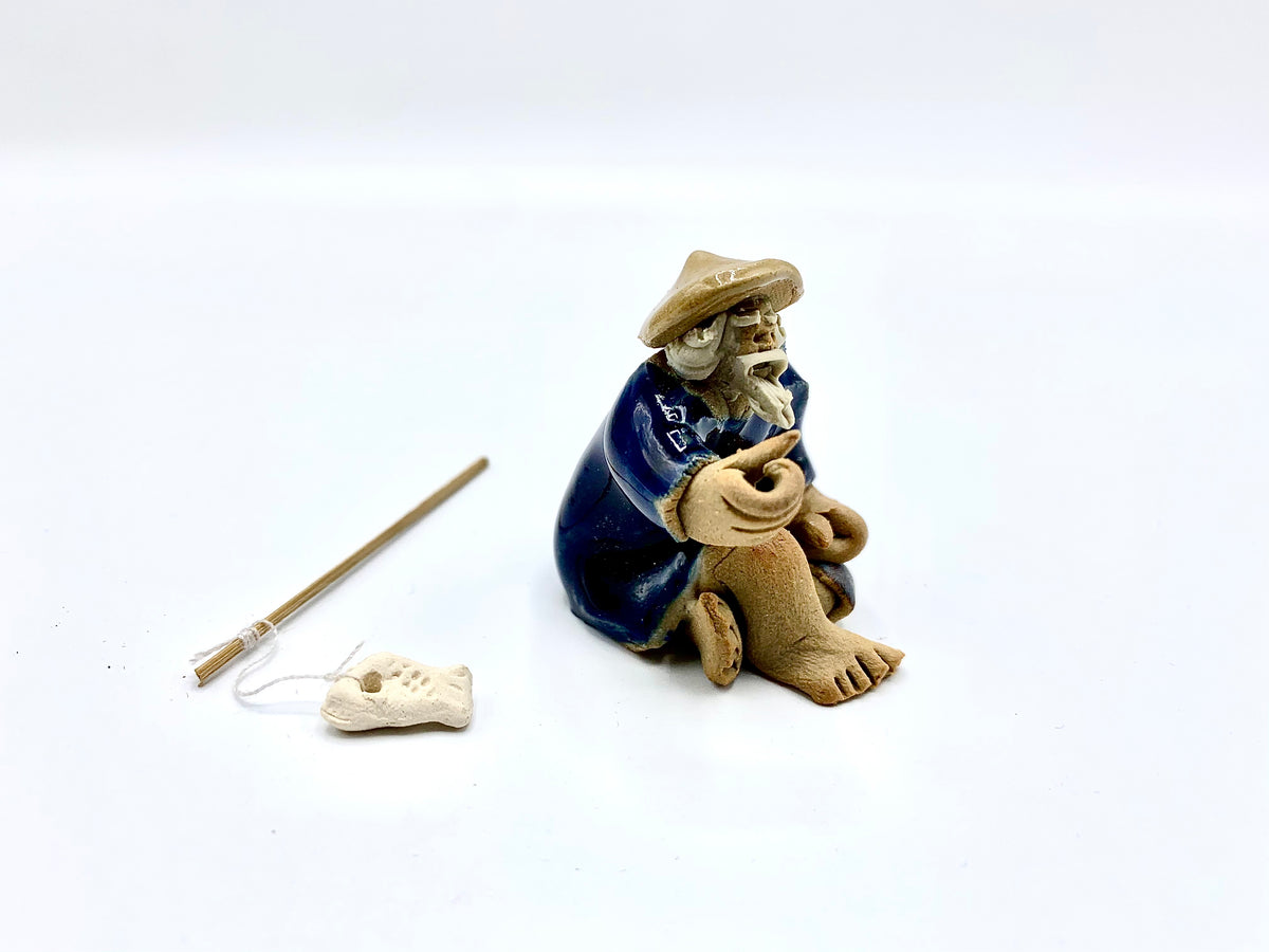 Ceramic Figurine - Fisherman With Fishing pole 1.25in x 1.5in