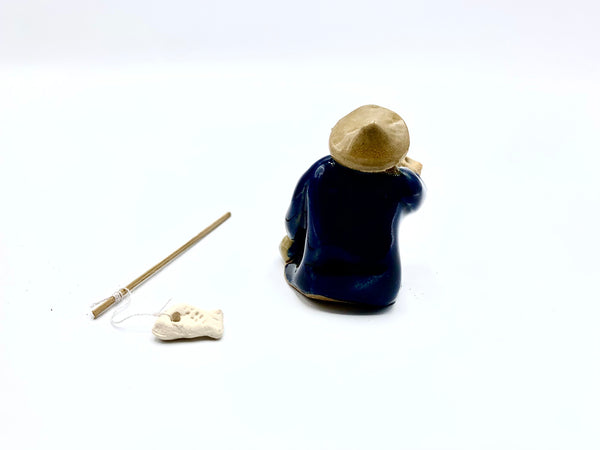 Ceramic Figurine -  Fisherman With Fishing pole 1.25in x 1.5in